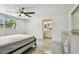 Bright bedroom boasts backyard view and easy access to the ensuite bathroom at 6200 13Th Ave, New Port Richey, FL 34653