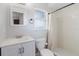 Bathroom featuring a white vanity, shower and toilet at 706 E Gate Dr, Safety Harbor, FL 34695