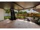 Spacious screened patio offers a great space for relaxing and enjoying the outdoors at 706 E Gate Dr, Safety Harbor, FL 34695