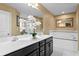 Luxurious bathroom showcasing a double vanity, a soaking tub, and a separate shower at 8636 Prairie Creek Dr, New Port Richey, FL 34655