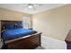 Bedroom featuring beige walls, neutral carpet, and a well-lit ambiance at 8636 Prairie Creek Dr, New Port Richey, FL 34655
