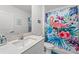 Bathroom featuring a decorative shower curtain with a single sink at 9815 Carabiner Way, Land O Lakes, FL 34637