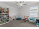 Bedroom featuring a window and toys at 9815 Carabiner Way, Land O Lakes, FL 34637