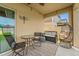 Cozy covered patio with comfortable seating and stylish decor, perfect for relaxing outdoors at 9815 Carabiner Way, Land O Lakes, FL 34637