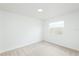 Spacious bedroom with a window allowing natural light and views of the fenced yard at 1040 Bridlewood Way, Brandon, FL 33511