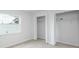 Bedroom showcases spacious closets and a window, perfect for ample storage and natural light at 1040 Bridlewood Way, Brandon, FL 33511