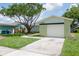 Charming home showcasing a one car garage and well-maintained lawn at 1040 Bridlewood Way, Brandon, FL 33511