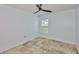 A bright bedroom with a window and decorative tiled flooring at 10430 Crestfield Dr, Riverview, FL 33569
