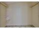 An empty closet with built-in shelves at 10430 Crestfield Dr, Riverview, FL 33569