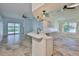 A modern kitchen with an open layout and bar seating area at 10430 Crestfield Dr, Riverview, FL 33569