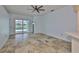 A bright room overlooking a pool and featuring decorative tile flooring at 10430 Crestfield Dr, Riverview, FL 33569