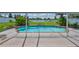 Backyard swimming pool is fenced and well-maintained with landscaped surroundings at 10430 Crestfield Dr, Riverview, FL 33569