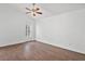 Bedroom with hardwood floors and window to let in natural light at 10462 Lucaya Dr, Tampa, FL 33647