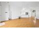 Bright, airy living room with vaulted ceiling, wood floors, and an open floor plan at 10462 Lucaya Dr, Tampa, FL 33647