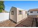 Outdoor shed provides extra storage space, complementing the well-maintained backyard and surrounding property at 105 Melrose Dr, Safety Harbor, FL 34695