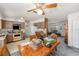 Functional kitchen with vintage appliances, wood cabinets, and adjacent dining area for easy meal service at 105 Melrose Dr, Safety Harbor, FL 34695