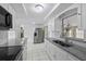 Well-equipped kitchen with stainless steel appliances and bright lighting at 10730 Premier Ave, Port Richey, FL 34668