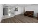 Open-concept living room with modern floors and lots of natural light at 10730 Premier Ave, Port Richey, FL 34668