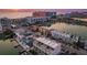 Breathtaking aerial view of waterfront homes, harbor, and oceanfront condos at sunset at 120 Brightwater Dr, Clearwater Beach, FL 33767