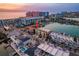 Beautiful aerial view of a townhouse complex near the beach with stunning views of the city and ocean at 120 Brightwater Dr, Clearwater Beach, FL 33767