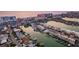 Panoramic aerial view of waterfront property with boats, and condo buildings on beach at 120 Brightwater Dr, Clearwater Beach, FL 33767