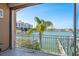 Enjoy waterfront views from this balcony overlooking the serene marina and harbor at 120 Brightwater Dr, Clearwater Beach, FL 33767