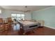 Well-lit game room with a pool table, comfortable seating, and a waterfront view at 120 Brightwater Dr, Clearwater Beach, FL 33767