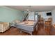 Bright game room with a pool table, comfortable seating, and a staircase leading upstairs at 120 Brightwater Dr, Clearwater Beach, FL 33767