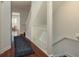 Hallway with beautiful hardwood flooring leading to staircase and rooms at 120 Brightwater Dr, Clearwater Beach, FL 33767