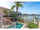 Private waterfront hot tub with views of the marina and surrounding cityscape at 120 Brightwater Dr, Clearwater Beach, FL 33767