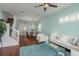 Bright living room with an open floor plan, coastal decor, and beautiful hardwood floors at 120 Brightwater Dr, Clearwater Beach, FL 33767