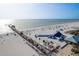 An overhead shot of a pier and an activity area that includes a giant slide at 120 Brightwater Dr, Clearwater Beach, FL 33767