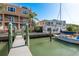 Stunning waterfront home with a private dock, sailboat and picturesque views at 120 Brightwater Dr, Clearwater Beach, FL 33767
