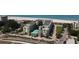 Breathtaking aerial view of a beachfront condo complex with a beautiful beach and lush landscaping at 12000 Gulf Blvd # 403-S, Treasure Island, FL 33706