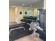 Bright exercise room with mirrored walls and a variety of weight training equipment for a complete workout at 12000 Gulf Blvd # 403-S, Treasure Island, FL 33706