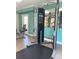 Well-equipped exercise room featuring modern machines and a view of the outdoors at 12000 Gulf Blvd # 403-S, Treasure Island, FL 33706