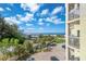 A beautiful view showcasing the building, nearby beach and well-maintained parking lot at 12000 Gulf Blvd # 403-S, Treasure Island, FL 33706