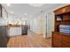 Open kitchen with wood-look floors flows to the living spaces and ample closet storage at 12000 Gulf Blvd # 403-S, Treasure Island, FL 33706