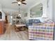 Sun-filled living room with an open concept design and views of the modern kitchen at 12000 Gulf Blvd # 403-S, Treasure Island, FL 33706