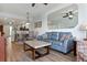 Bright living room features modern furnishings, wood floors, and an open floor plan at 12000 Gulf Blvd # 403-S, Treasure Island, FL 33706