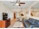 Open-concept living area with a dining table, comfortable seating, and a TV, offering a relaxed atmosphere at 12000 Gulf Blvd # 403-S, Treasure Island, FL 33706