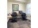 Well-lit office space featuring neutral tones and comfortable seating perfect for remote work or study at 12000 Gulf Blvd # 403-S, Treasure Island, FL 33706