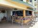 Inviting outdoor bar with colorful tile accents and ample seating, perfect for entertaining at 12000 Gulf Blvd # 403-S, Treasure Island, FL 33706