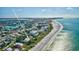 Breathtaking aerial view of property close to the ocean and beachfront at 12458 1St W St, Treasure Island, FL 33706