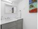 Clean and bright bathroom with white marble countertop and vanity at 12458 1St W St, Treasure Island, FL 33706