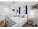Comfortable bedroom with a view of the ensuite bathroom at 12458 1St W St, Treasure Island, FL 33706