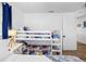 A nautical themed room with a twin bed and a bunk bed at 12458 1St W St, Treasure Island, FL 33706