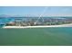 Breathtaking coastal view of beachfront homes near the bay and Gulf at 12458 1St W St, Treasure Island, FL 33706