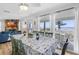Lovely dining area with an ocean view and seamless flow into the living room at 12458 1St W St, Treasure Island, FL 33706