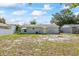 This backyard features partial fencing, ample space, and potential for landscaping at 12660 118Th St, Largo, FL 33778